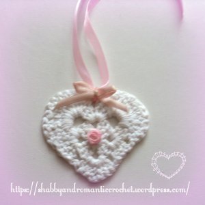white ribbon yard crochet heart